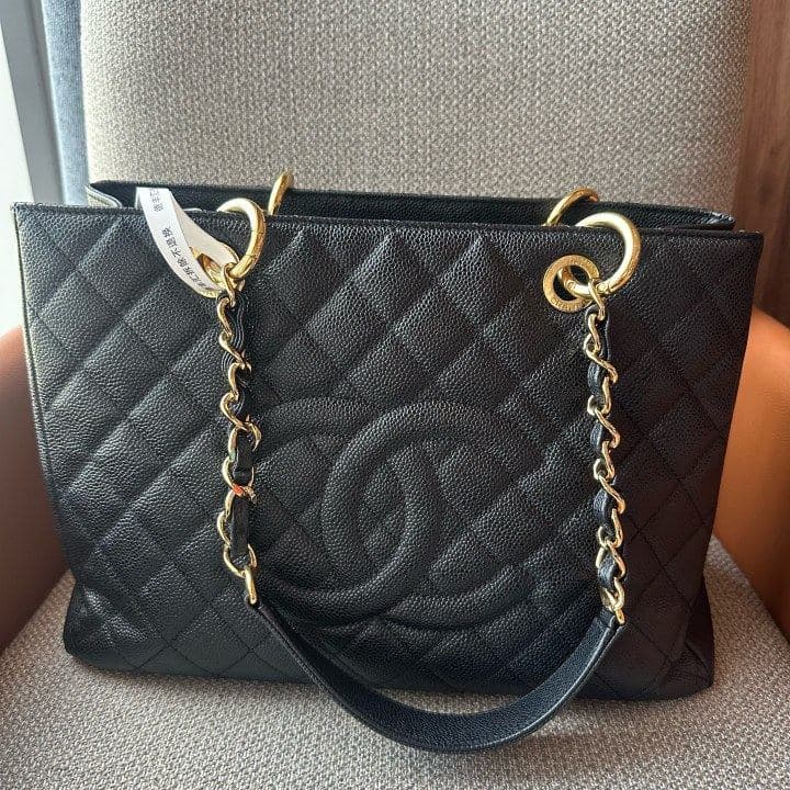 Chanel Grand Shopping Tote, Black / gold hardware, condition grade A
