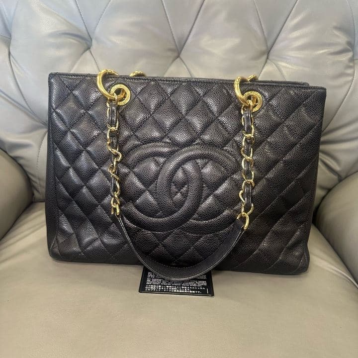 Chanel Grand Shopping Tote, Black / gold hardware, condition grade A