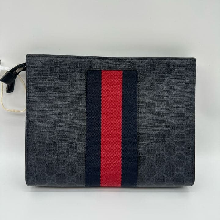 Gucci GG Supreme Clutch, Black, condition grade A