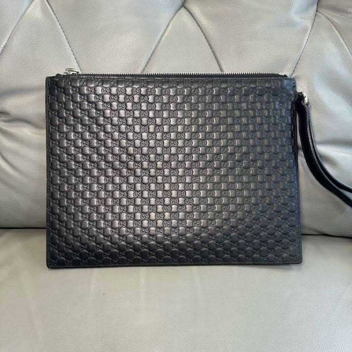 Gucci Embossed Leather Clutch, , condition grade A