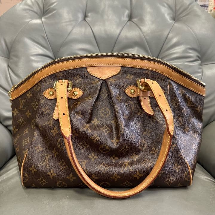 Louis Vuitton Tivoli, Brown, condition grade A