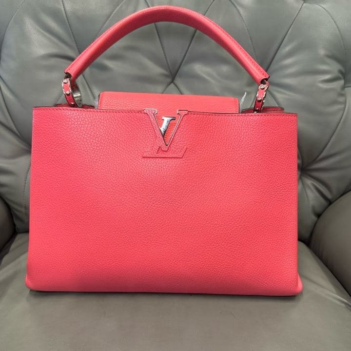 Louis Vuitton Capucines, Pink, condition grade A