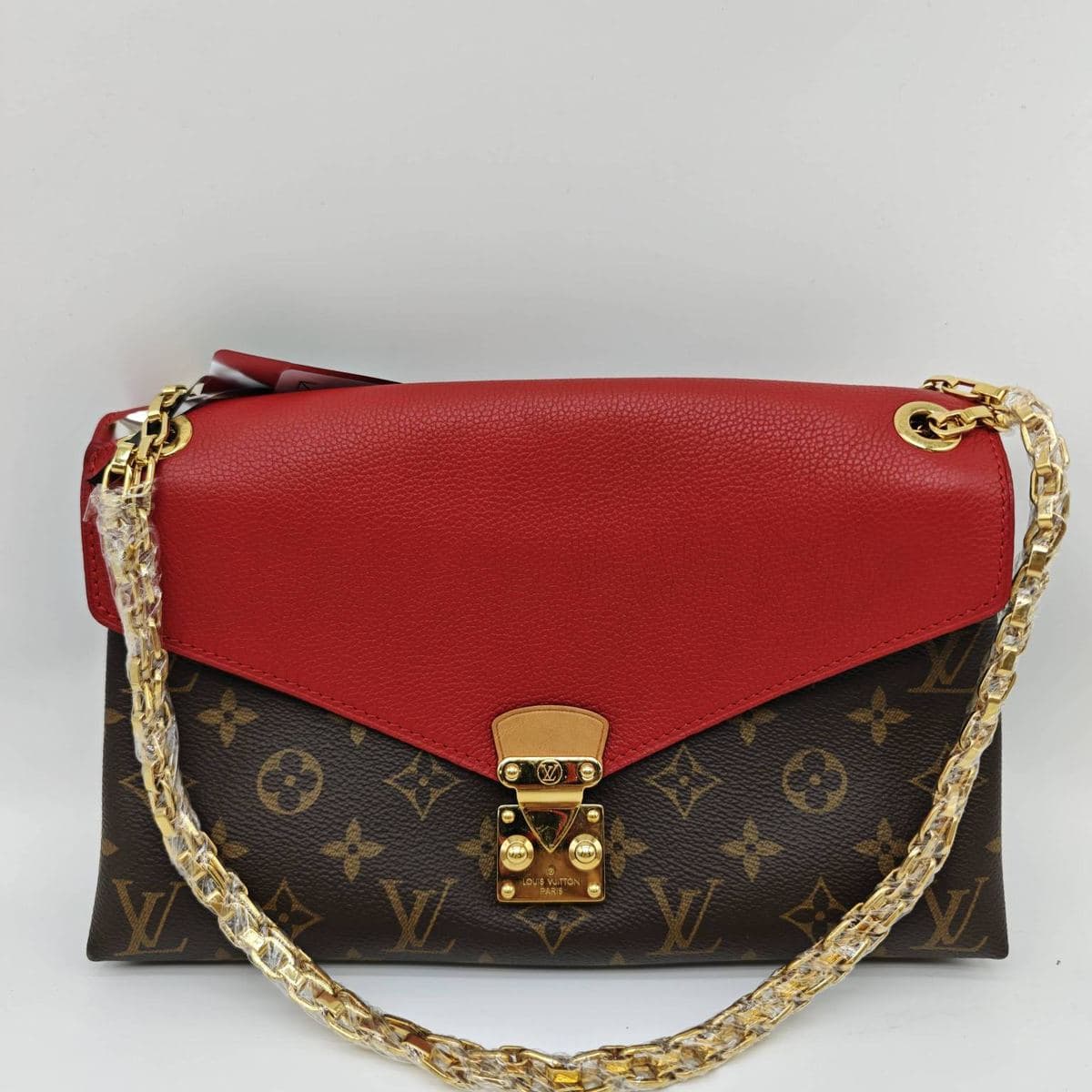 Louis Vuitton Monogram Envelope Chain Bag, Brown / Red, condition grade A