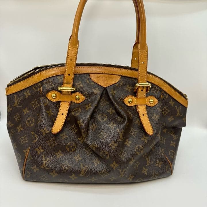 Louis Vuitton Tivoli, Brown, condition grade A