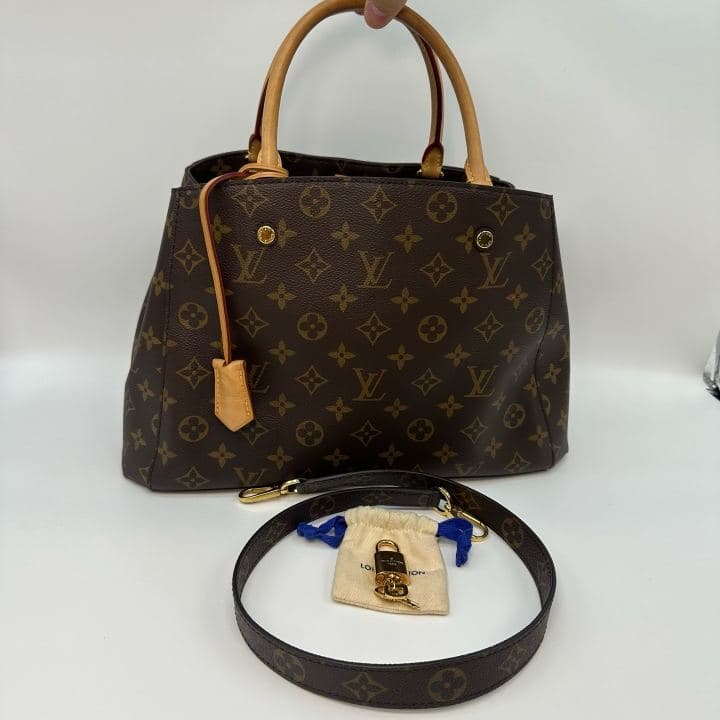 Louis Vuitton Montaigne MM, Brown, condition grade A