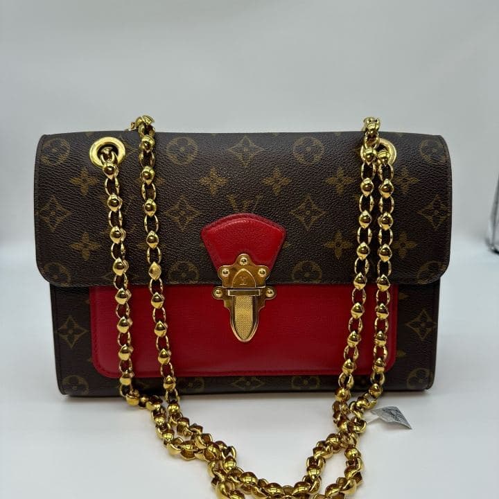 Louis Vuitton Victoire, Brown, condition grade A