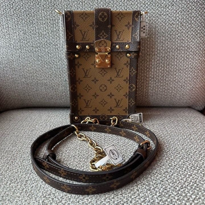 Louis Vuitton Vertical Trunk Pochette, Brown, condition grade A