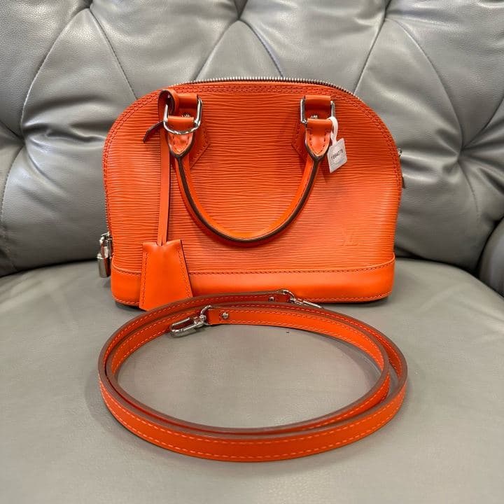 Louis Vuitton Alma (small), Orange, condition grade A