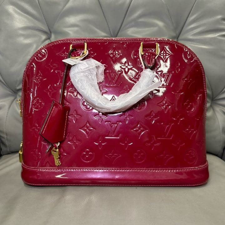 Louis Vuitton Alma, Red, condition grade A