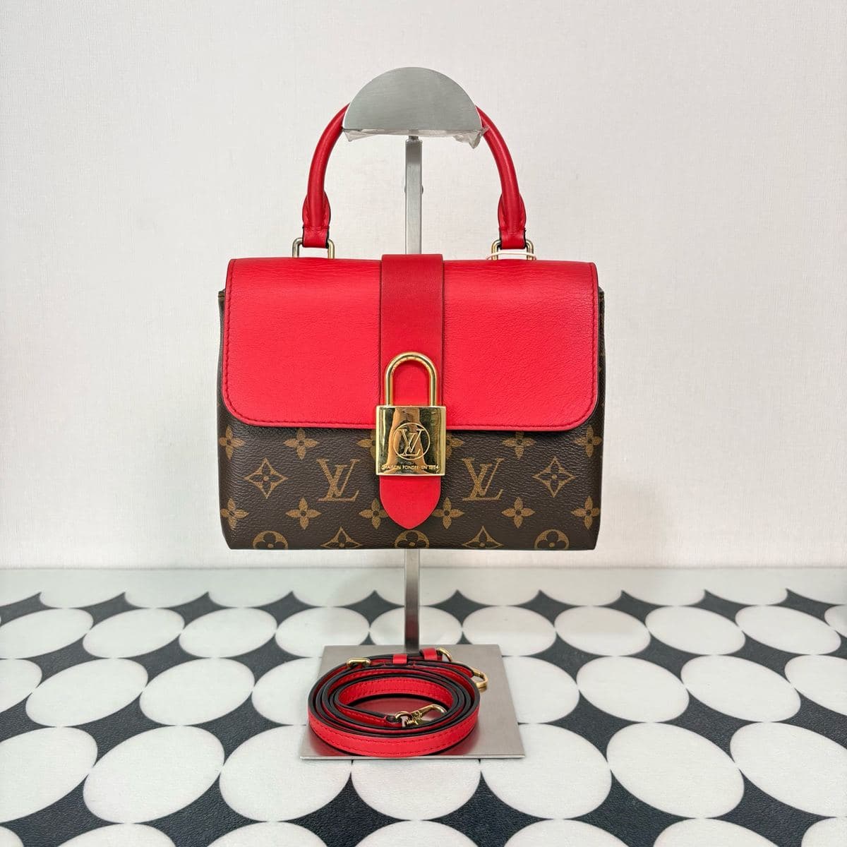 Louis Vuitton Locky BB, Brown / Red, condition grade A