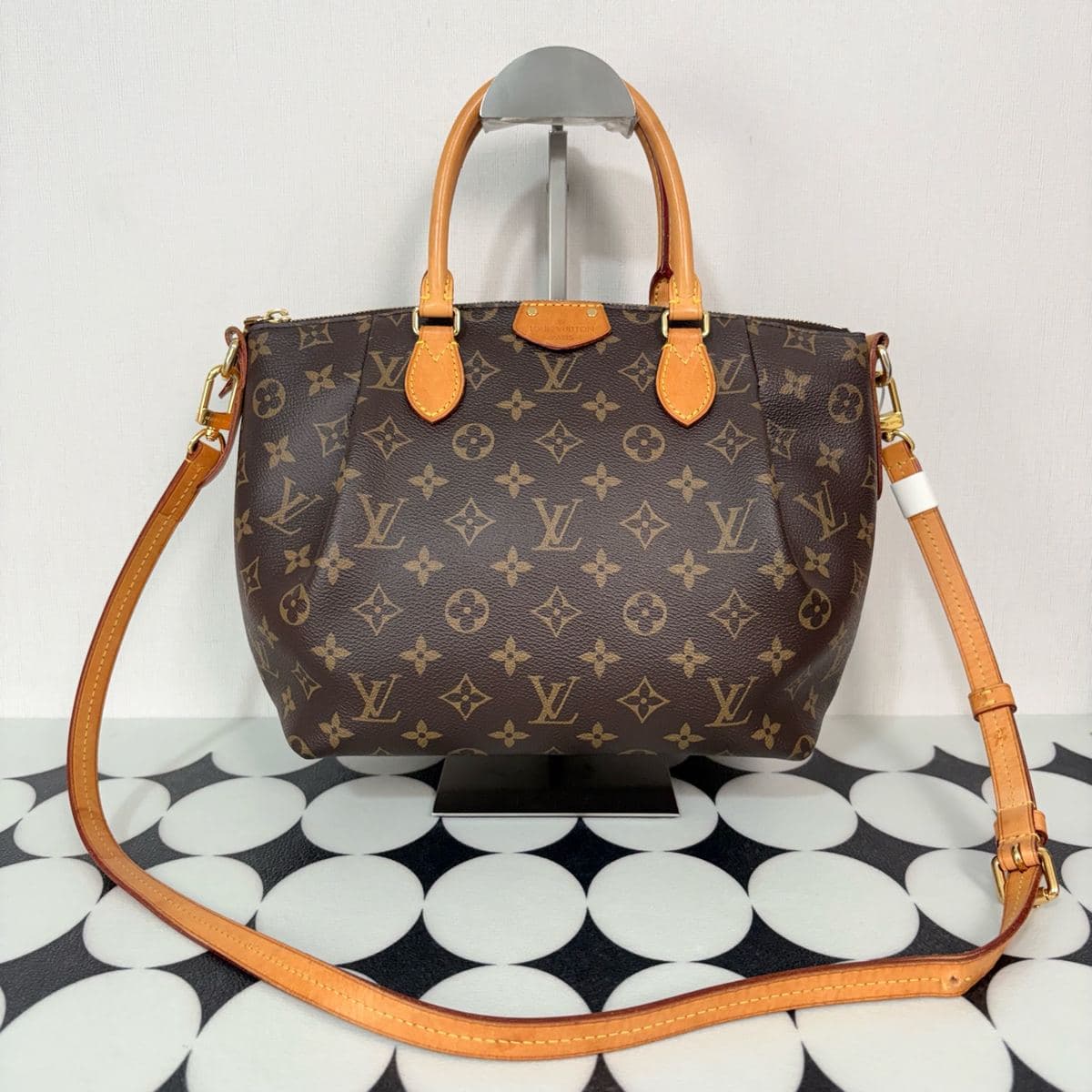 Louis Vuitton Tivoli, Brown, condition grade A